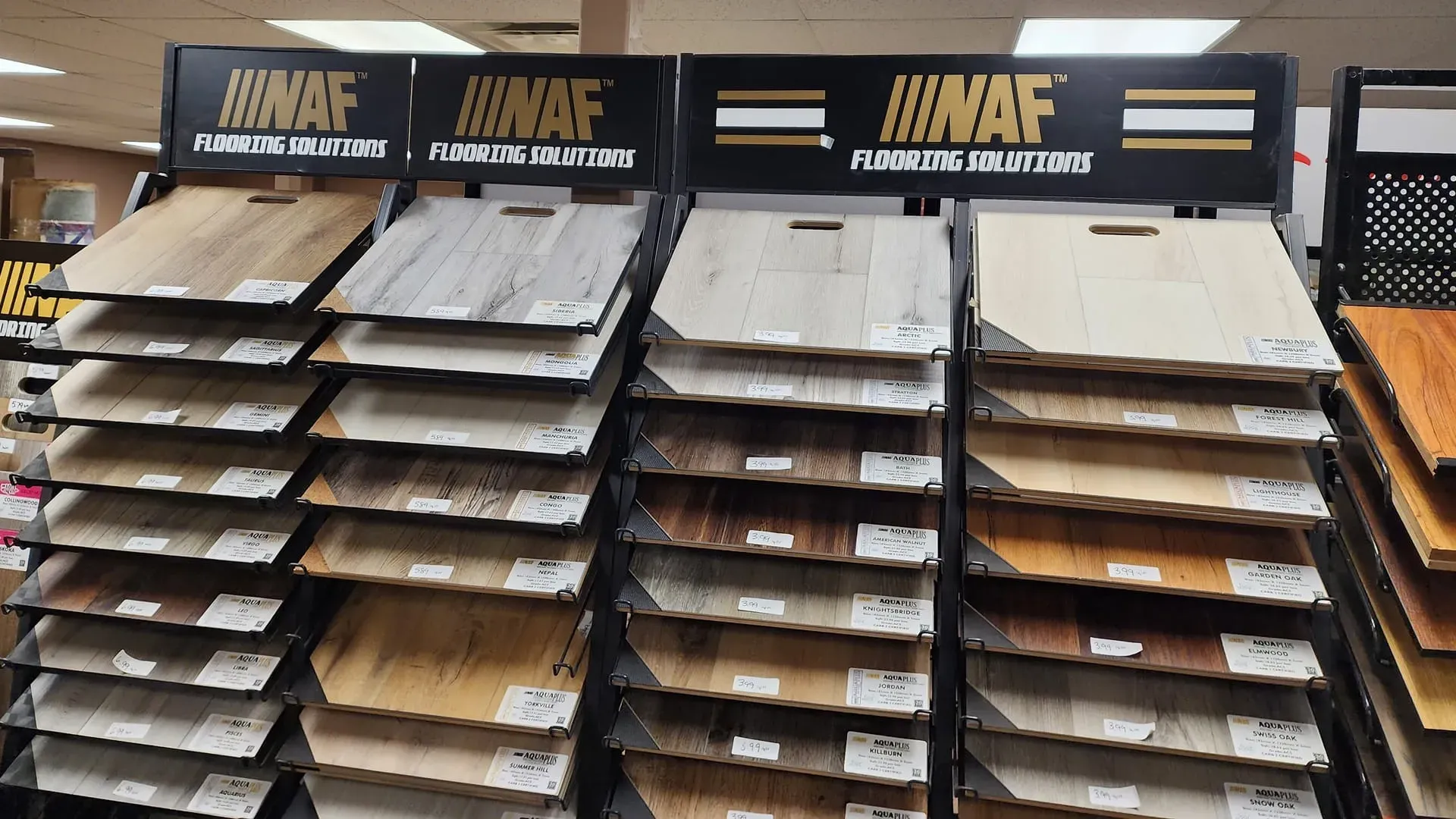 A display of different types of flooring in a store