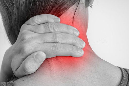 Woman Suffering Neck Pain | Coastal Neurology, Inc. | Daytona Beach