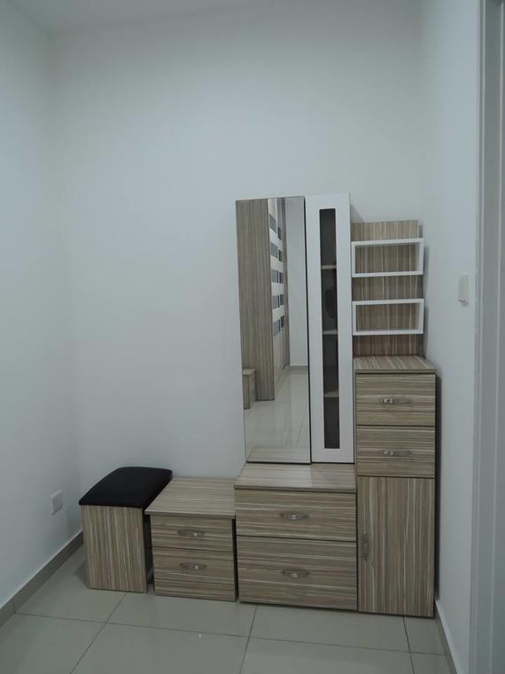 Bedroom furniture set: dresser, mirror, shelves, drawers, stool in a white-walled room.