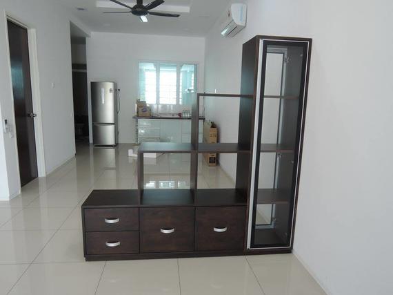 Dark brown shelving unit with drawers and display shelves, in a bright white-walled living room.