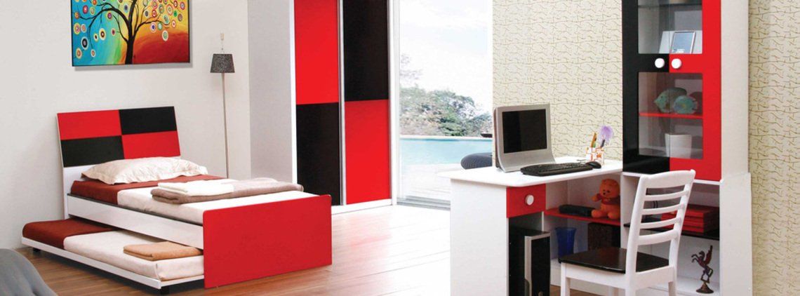 A modern child's bedroom with red and black furniture, including a bed, wardrobe, desk, and a window with a sea view.