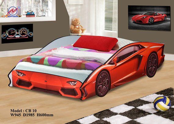 Red Lamborghini car-shaped bed in a child's room with car-themed decor.