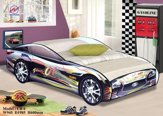 A race car bed in a child's room, with a checkered flag cabinet and a picture of a car.