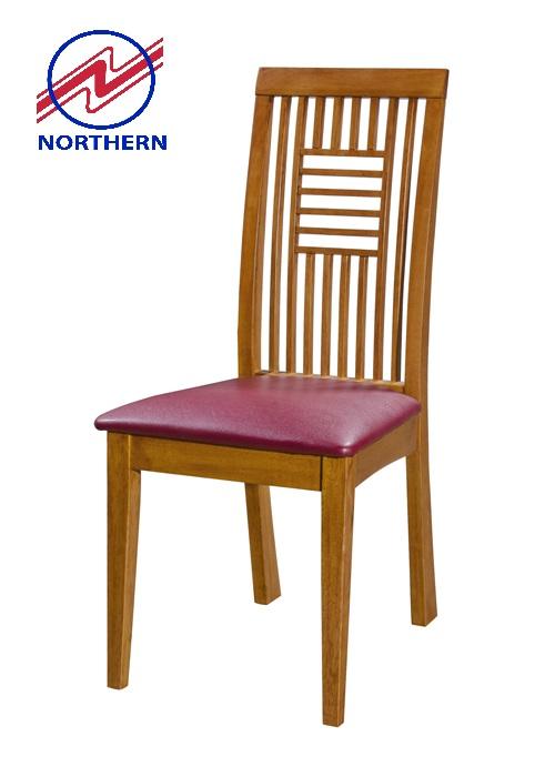 Wooden chair with a maroon seat and decorative back against a white background.