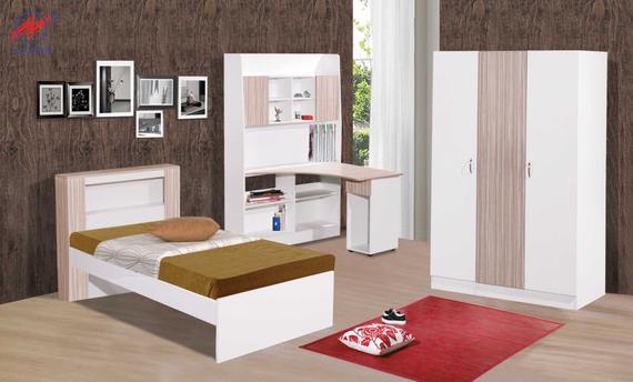 Bedroom furniture set: bed, desk, wardrobe, and wall art against wood-grain wall. Includes a red rug.