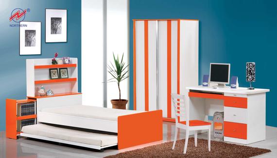 Modern orange and white children's bedroom set: bed, desk, shelves, wardrobe, and chair against a teal wall.