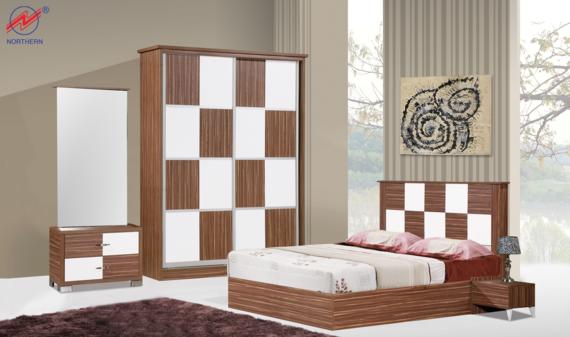 Bedroom set with a checkerboard-patterned wardrobe, bed, nightstand, and vanity. Brown and white.