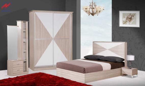 Bedroom furniture set: light wood bed, wardrobe, dresser, and nightstand with geometric white accents. Red rug.