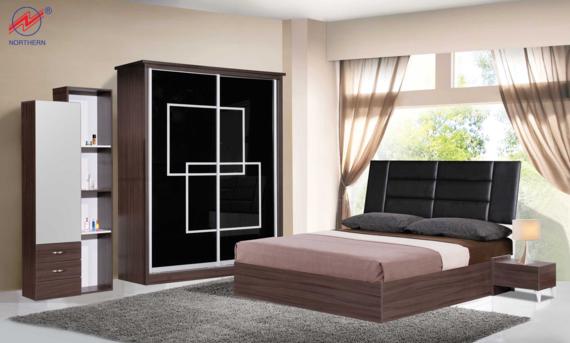 Bedroom furniture set: bed, wardrobe with black panels, shelves. Brown and white. Sunlight through window.