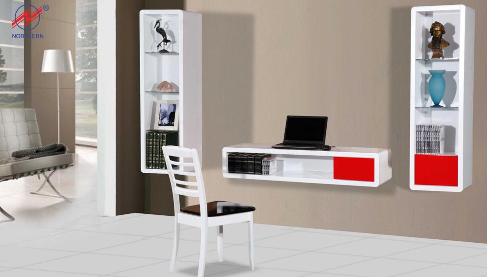 White and red modern floating entertainment center and shelves on a beige wall. A white chair is in front.