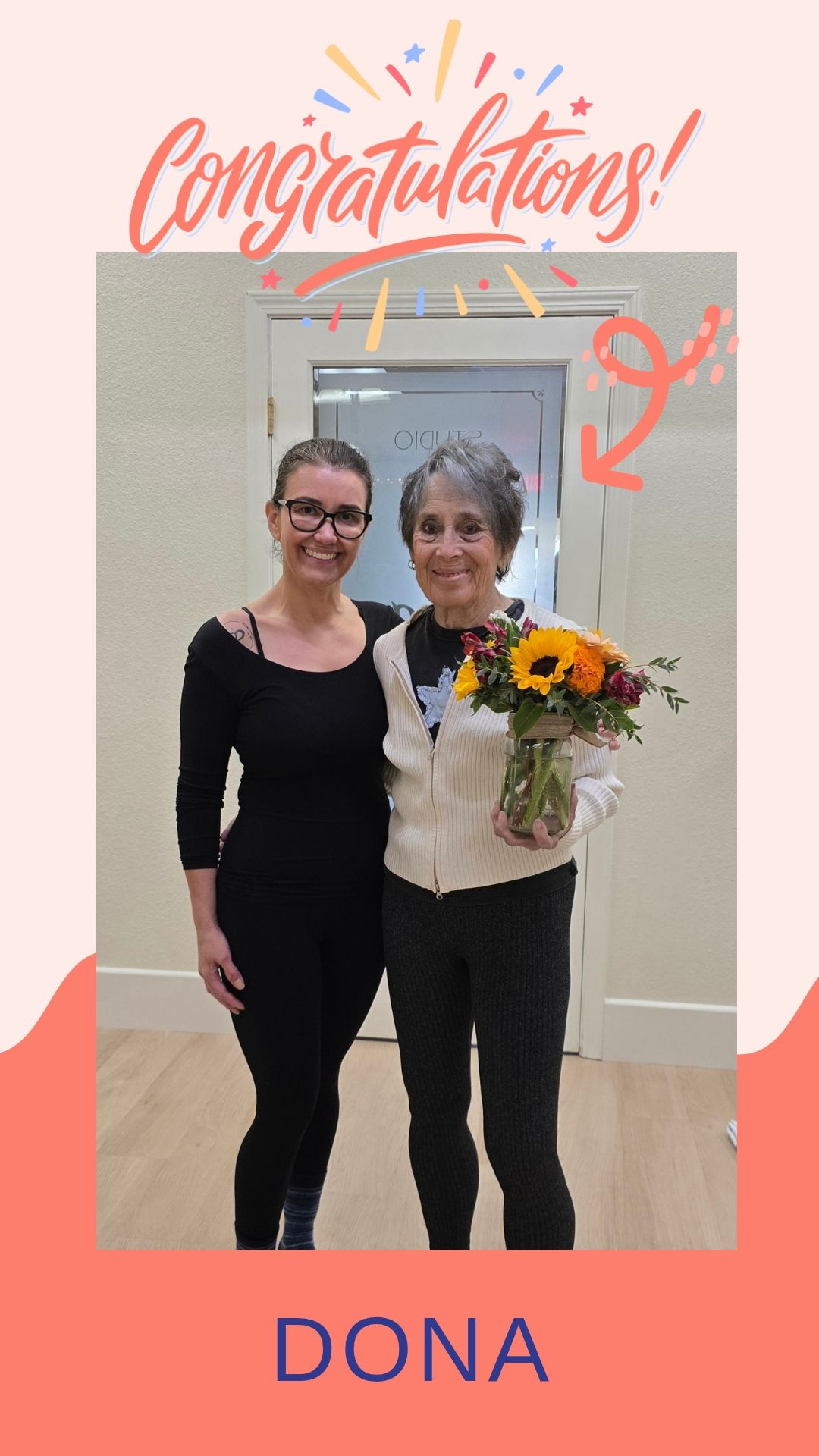 A goat is standing under a sign that says goat hugs