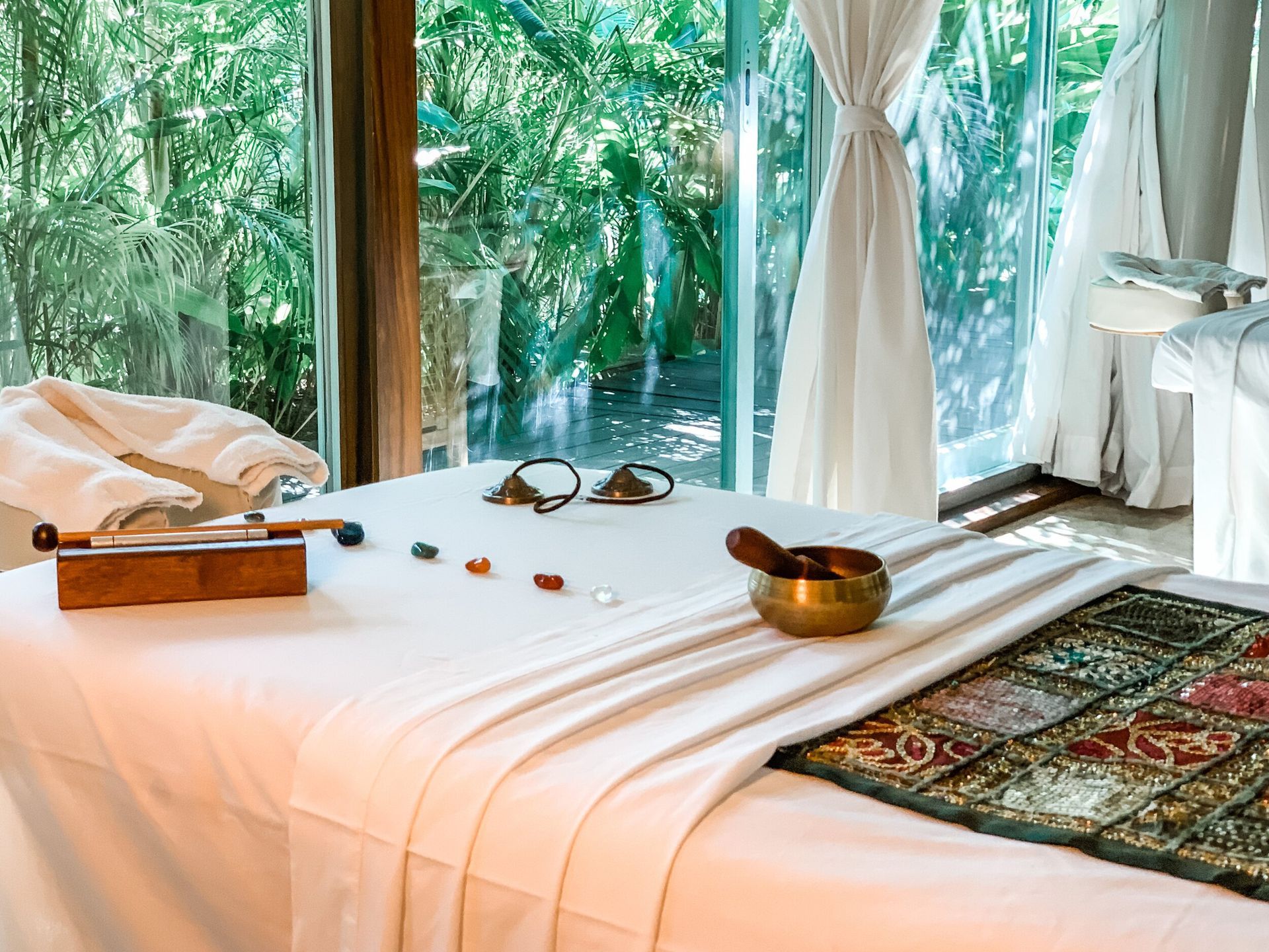 Two people are getting a massage in a spa.