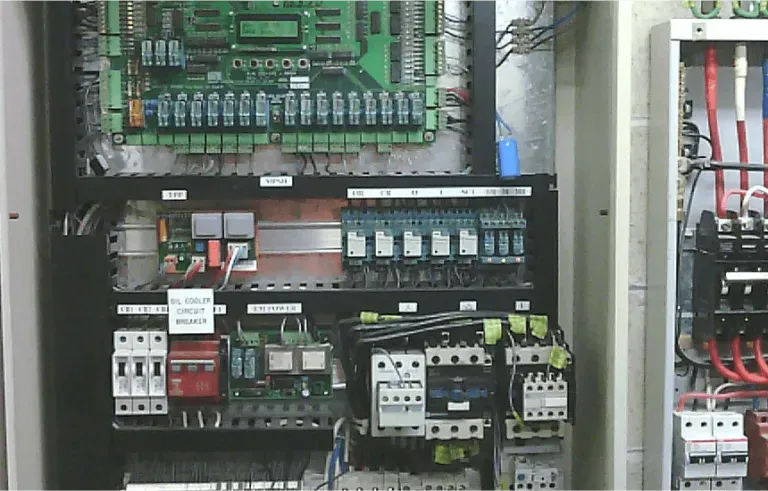 The Inside of a Control Panel With a Green Board — Maratustech In Woy Woy, NSW