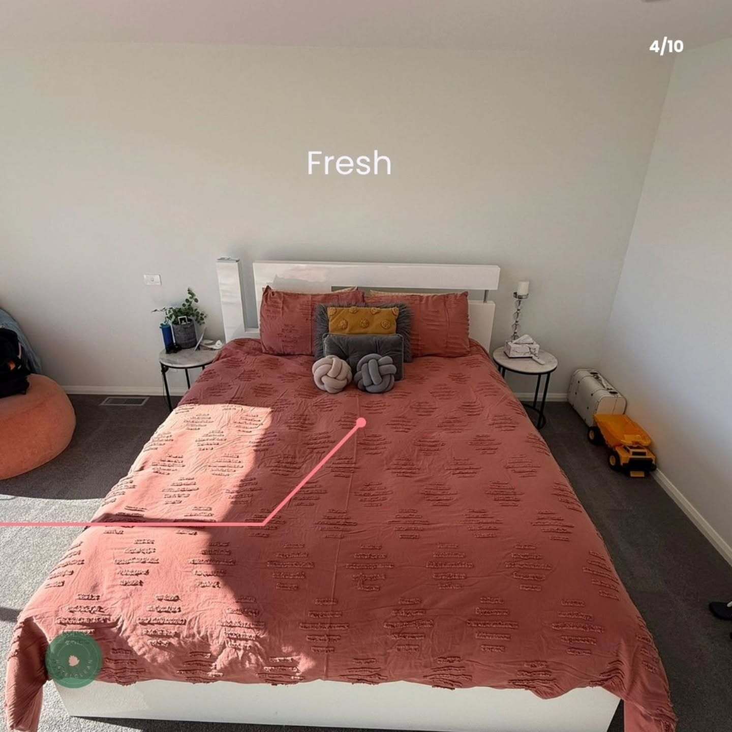 A bedroom with a bed and a sign that says fresh