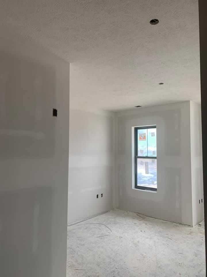 There is a window in the middle of the room.