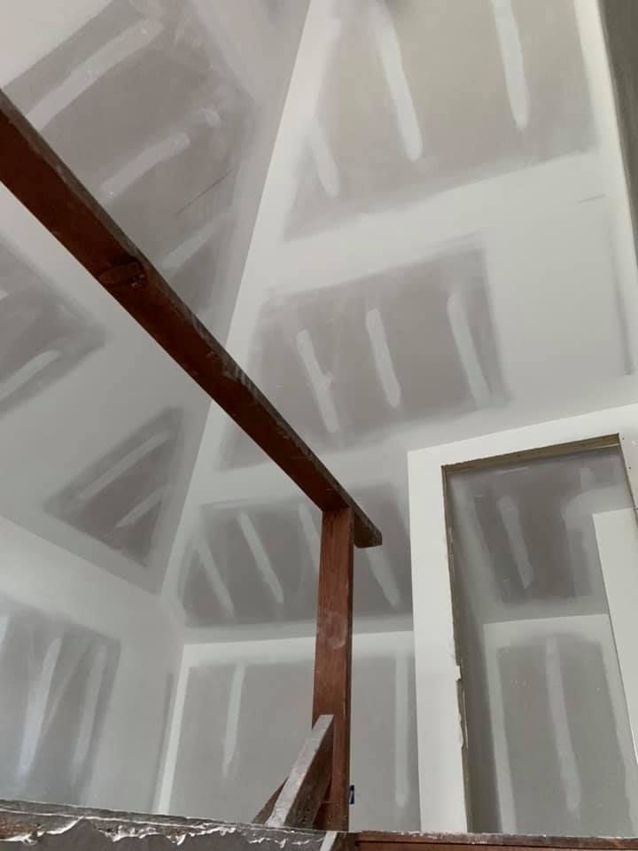 Looking up at the ceiling of a room under construction