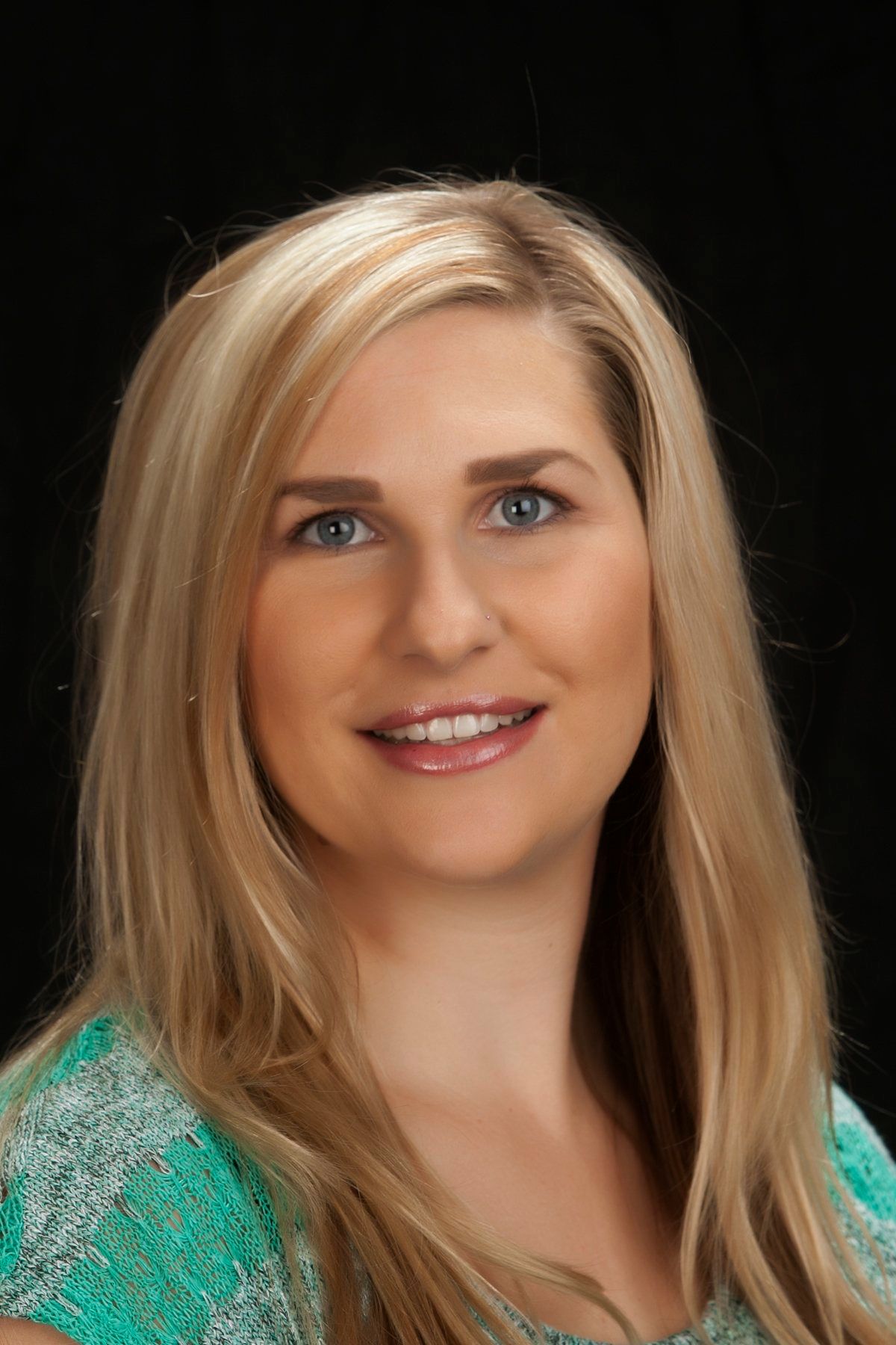 Photo of Ashley, office manager at Premier Beauty Medical Aesthetics.