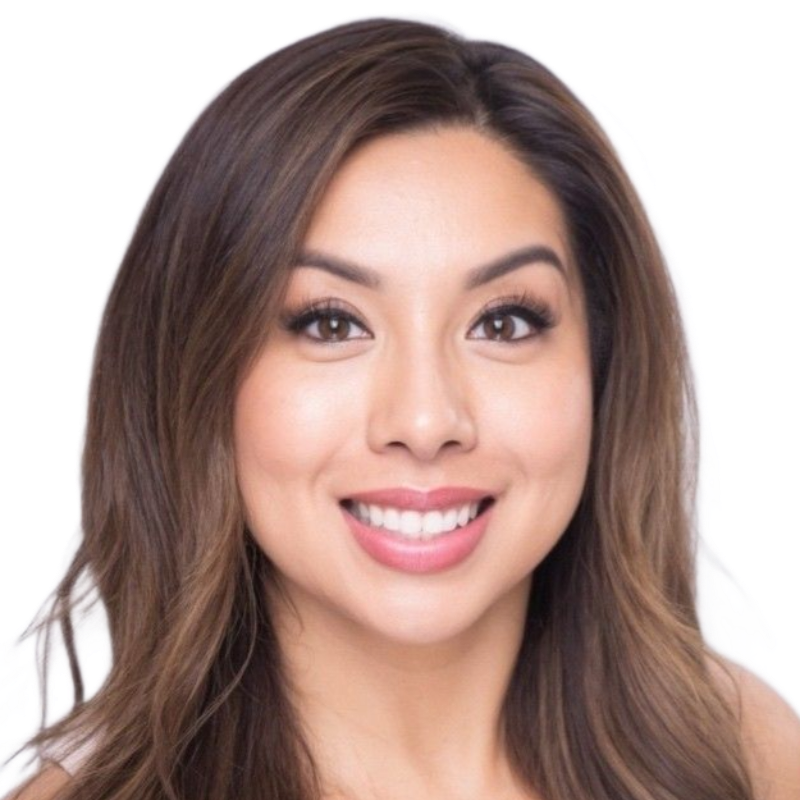 Woman with brown hair smiles, against a white background.