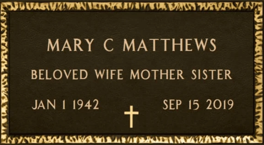 A bronze grave marker for mary c matthews