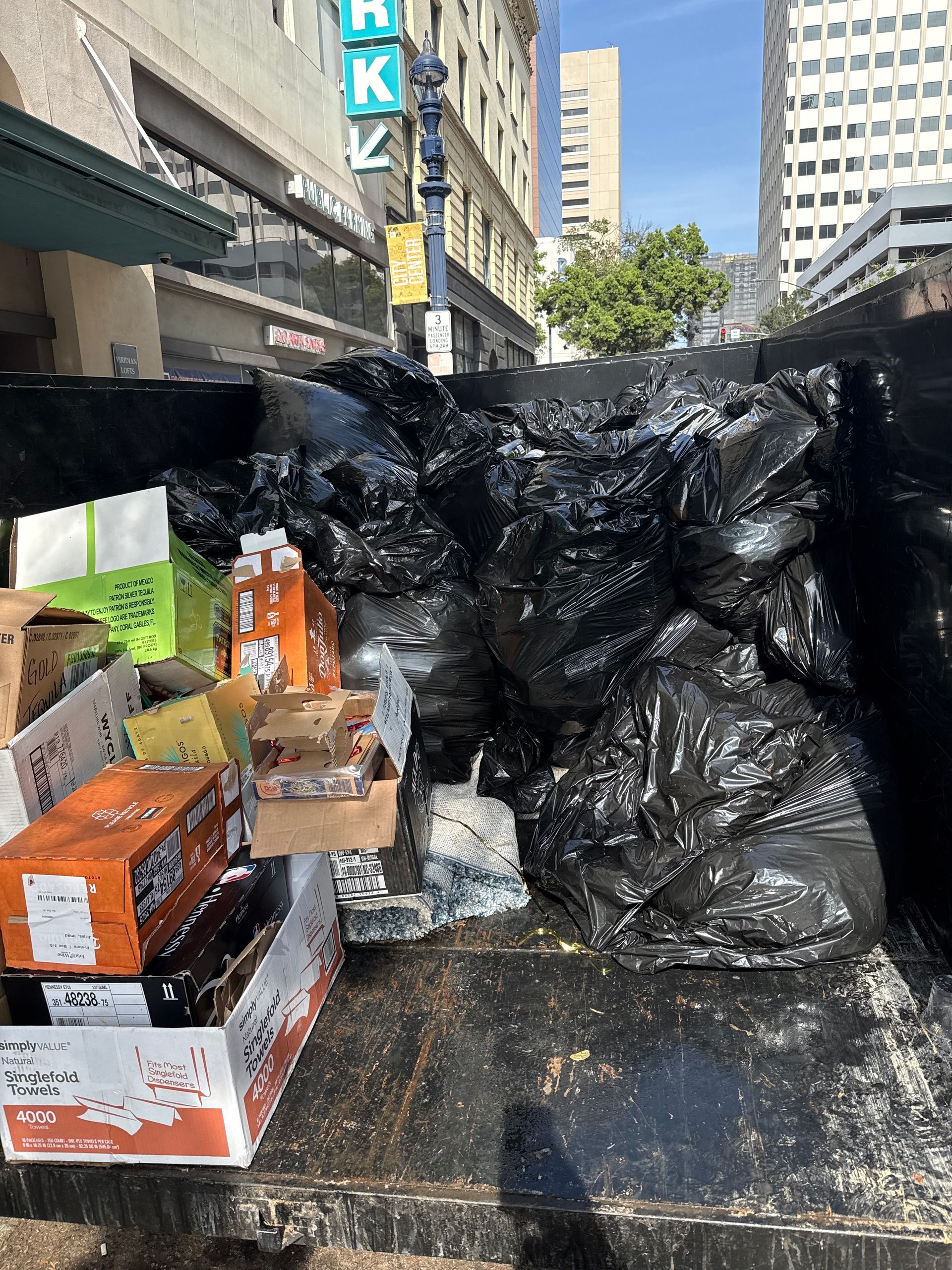Pile of rubble including bricks, concrete, and broken tiles; likely from demolition.