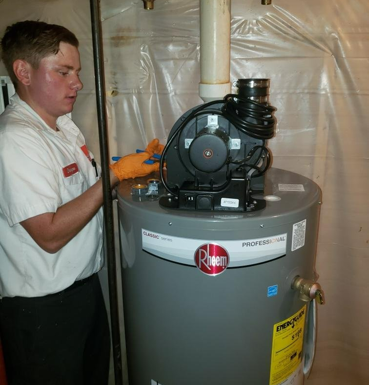A professional doing water heater installation in Benton Harbor, MI