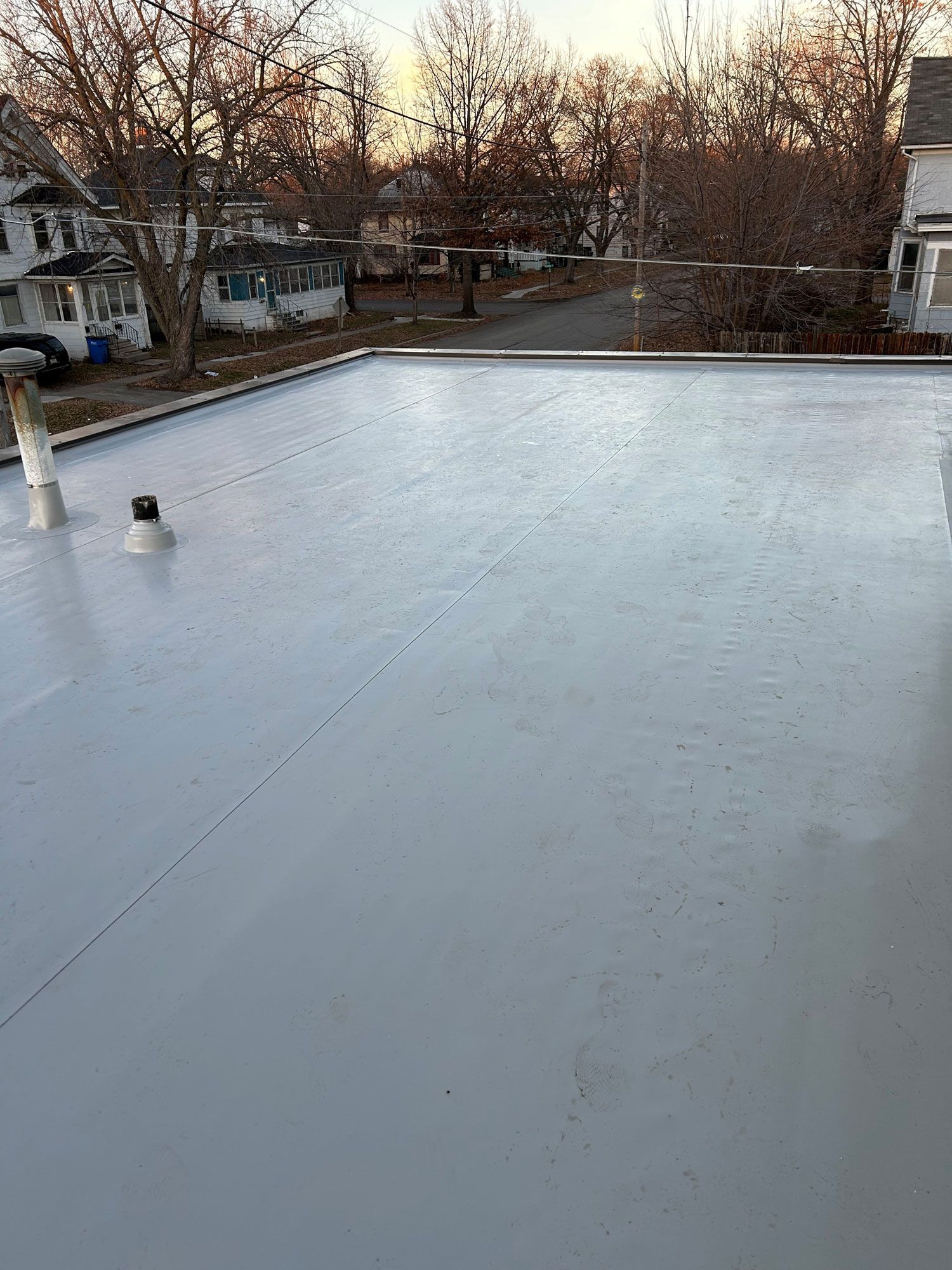 White Roof With A Chimney — Waverly, IA — Star Line Coatings