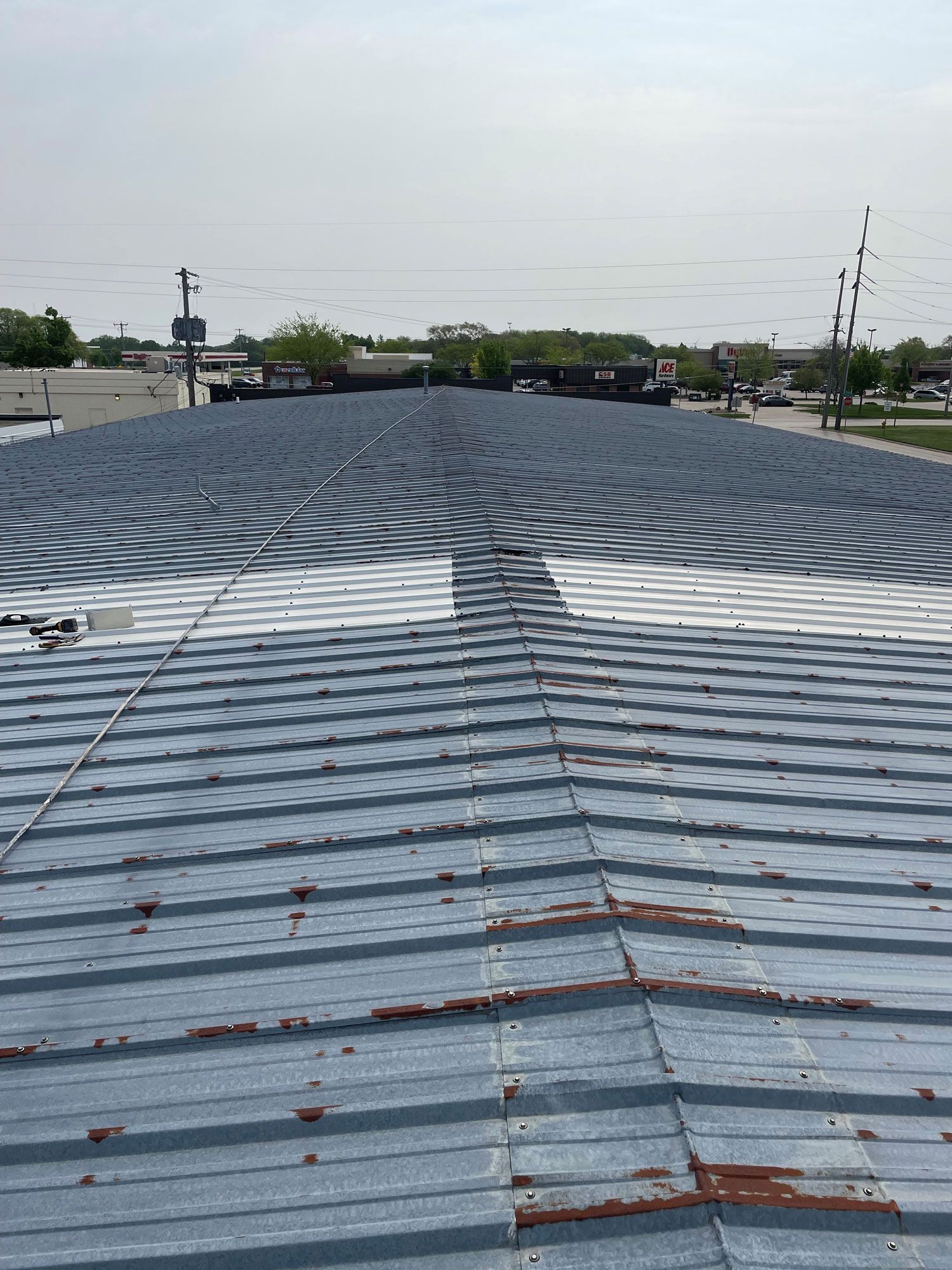 Rusty Roof Of A Building — Waverly, IA — Star Line Coatings