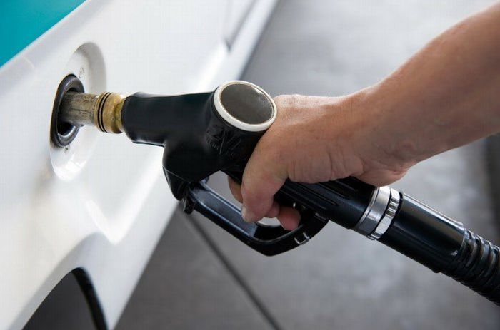 Adding Car Fuel From Gasoline Station — Lexington, KY — Powers Transmission