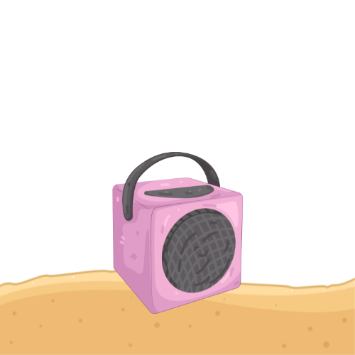 Pink cube-shaped speaker with a black handle and speaker grill sitting on sand.