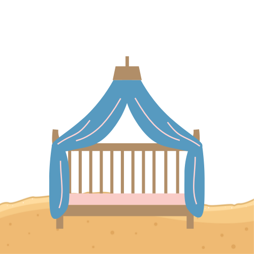 Bed with blue curtains on a sandy surface.