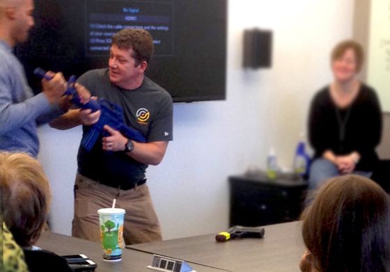Personal defense training demonstration in an organization