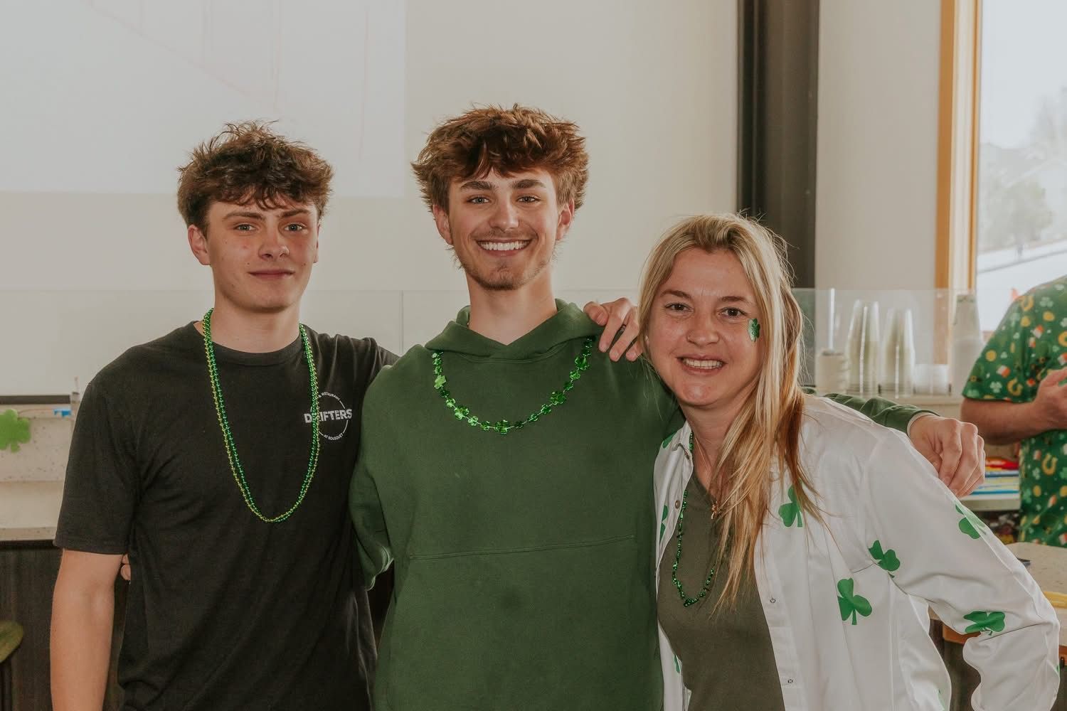 Beautiful young waitress with face protective mask serving delicious burger to middle age male customer. Corona virus and small business is open for work concept.