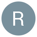 The letter r is in a blue circle on a white background.