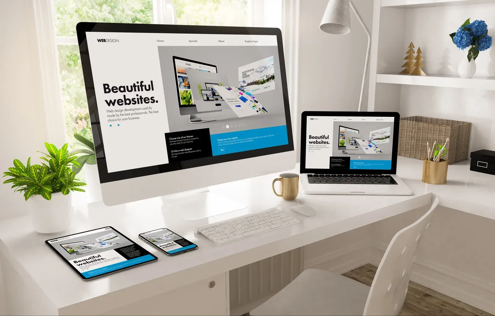 Website design displayed on multiple devices: desktop, laptop, tablet, phone, on a white desk.