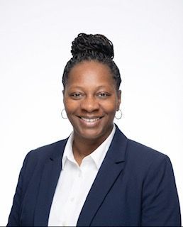 Board president of Nightlife therapy and LCDC therapist Ana Arellano smiles.