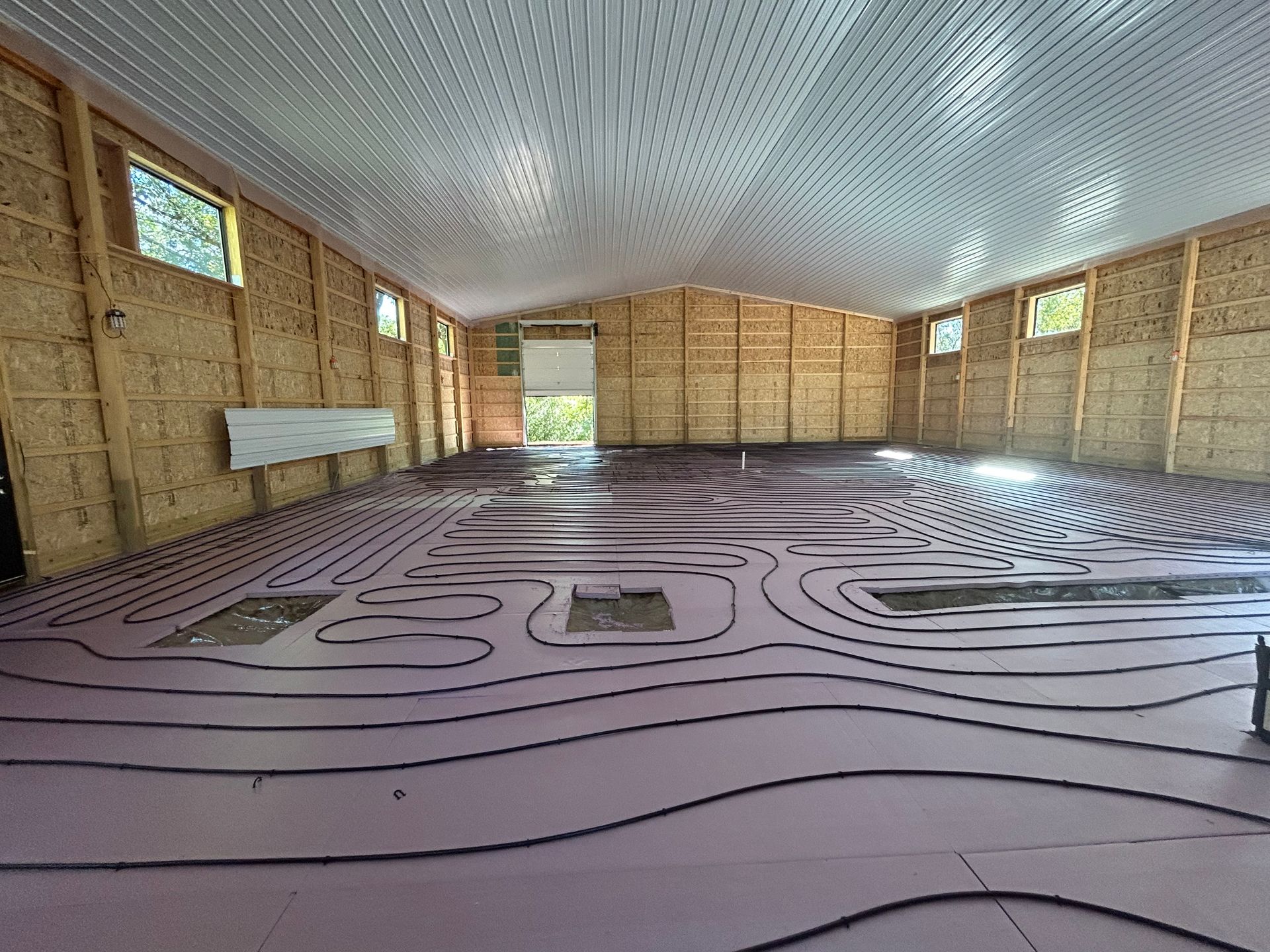 A large room with a maze pattern on the floor.