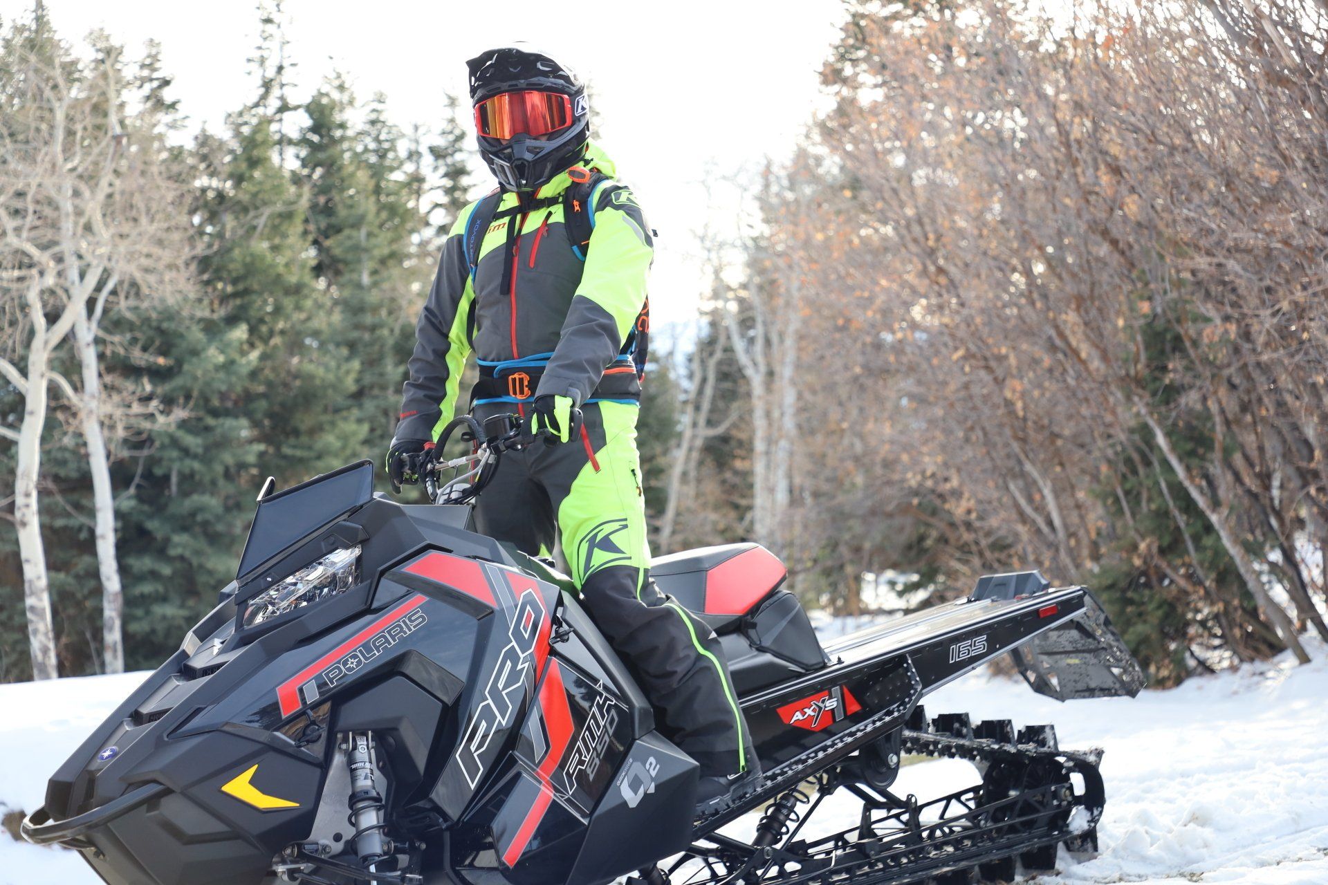 Person sitting on snowmobile