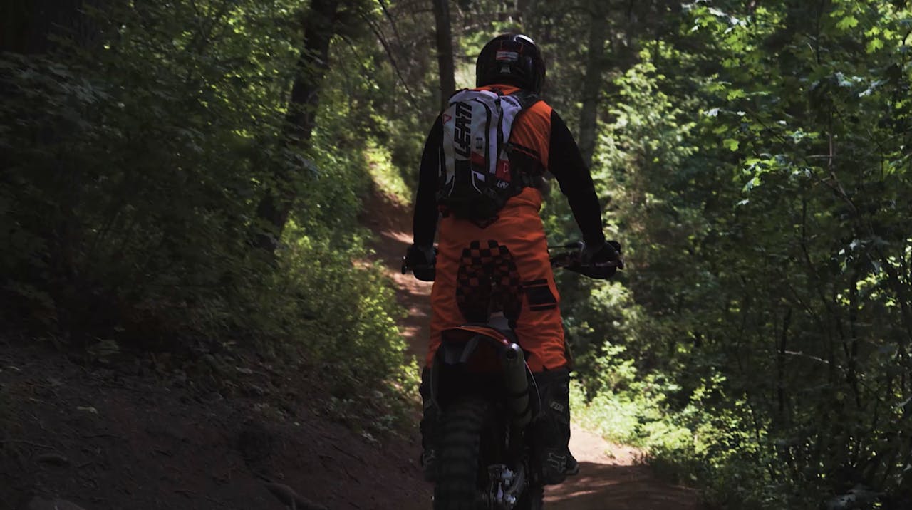 1 motorcycle rider on a single track off-road trail in Utah