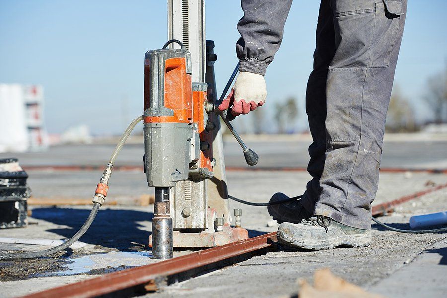 man drilling the concrete