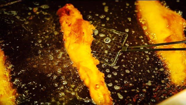 fish frying in groundnut oil