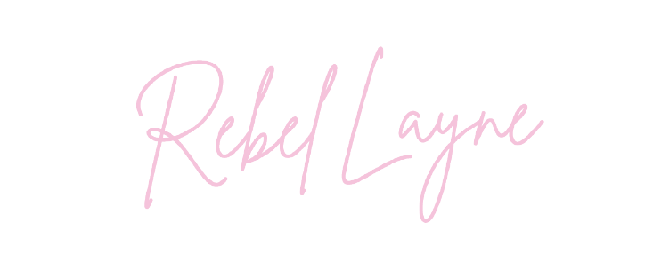 Pink cursive text that reads