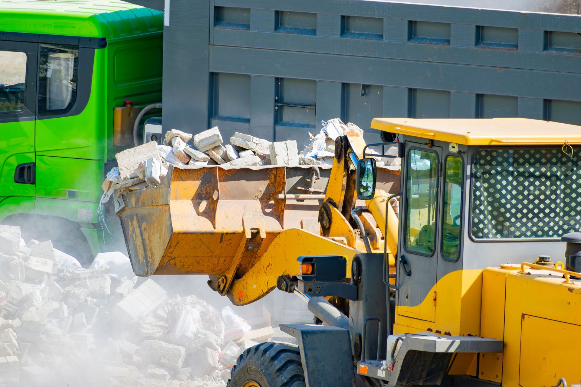 Oil pump with two people in safety gear pointing towards it under a clear, blue sky. Oil pump with two people in safety gear pointing towards it under a clear, blue sky.
