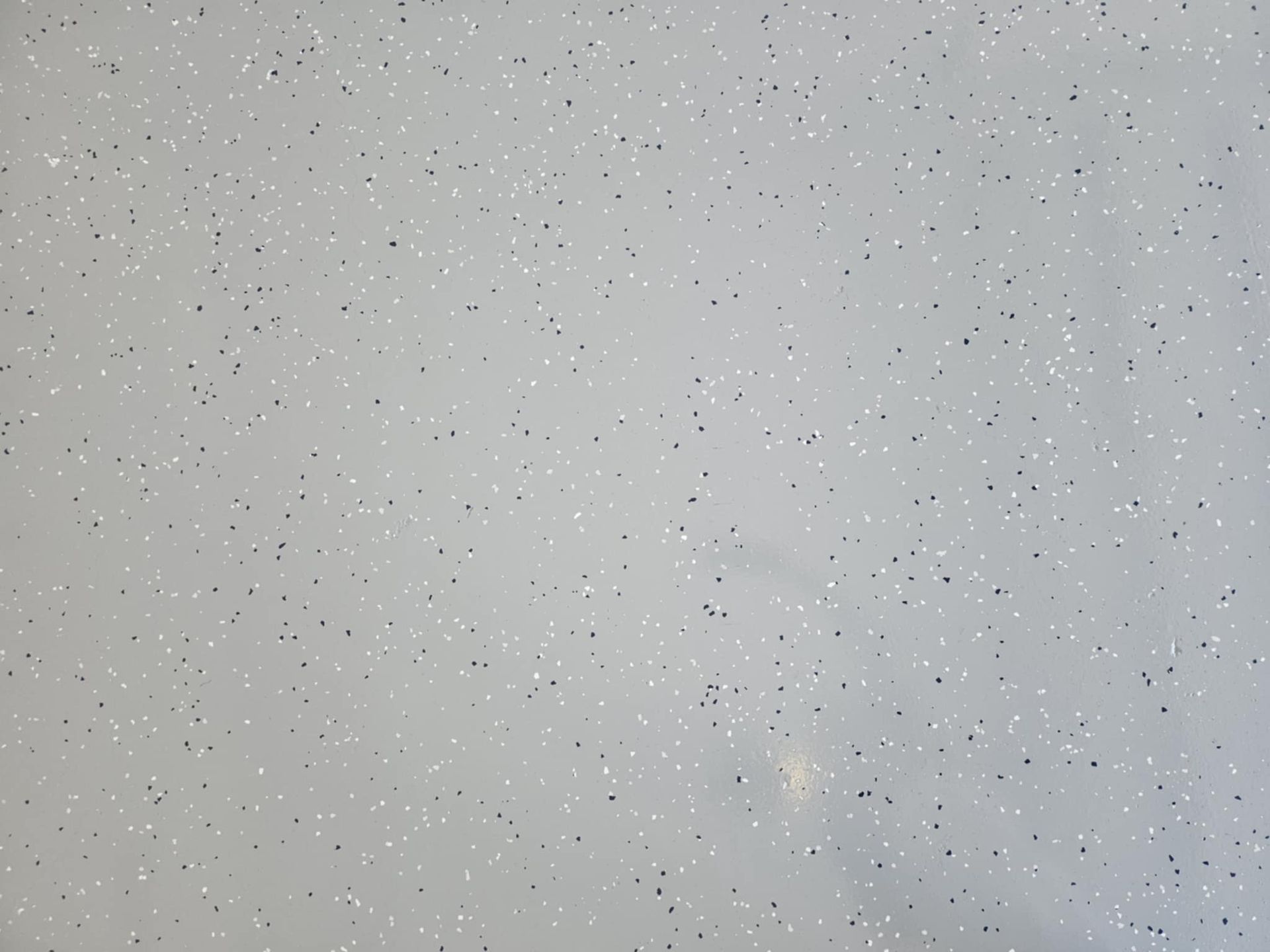 A close up of a white surface with glitter on it.— That Painter Guy In South Nowra, NSW