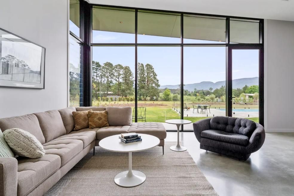 A Living Room With A Couch A Chair and A Table  — That Painter Guy In South Nowra, NSW