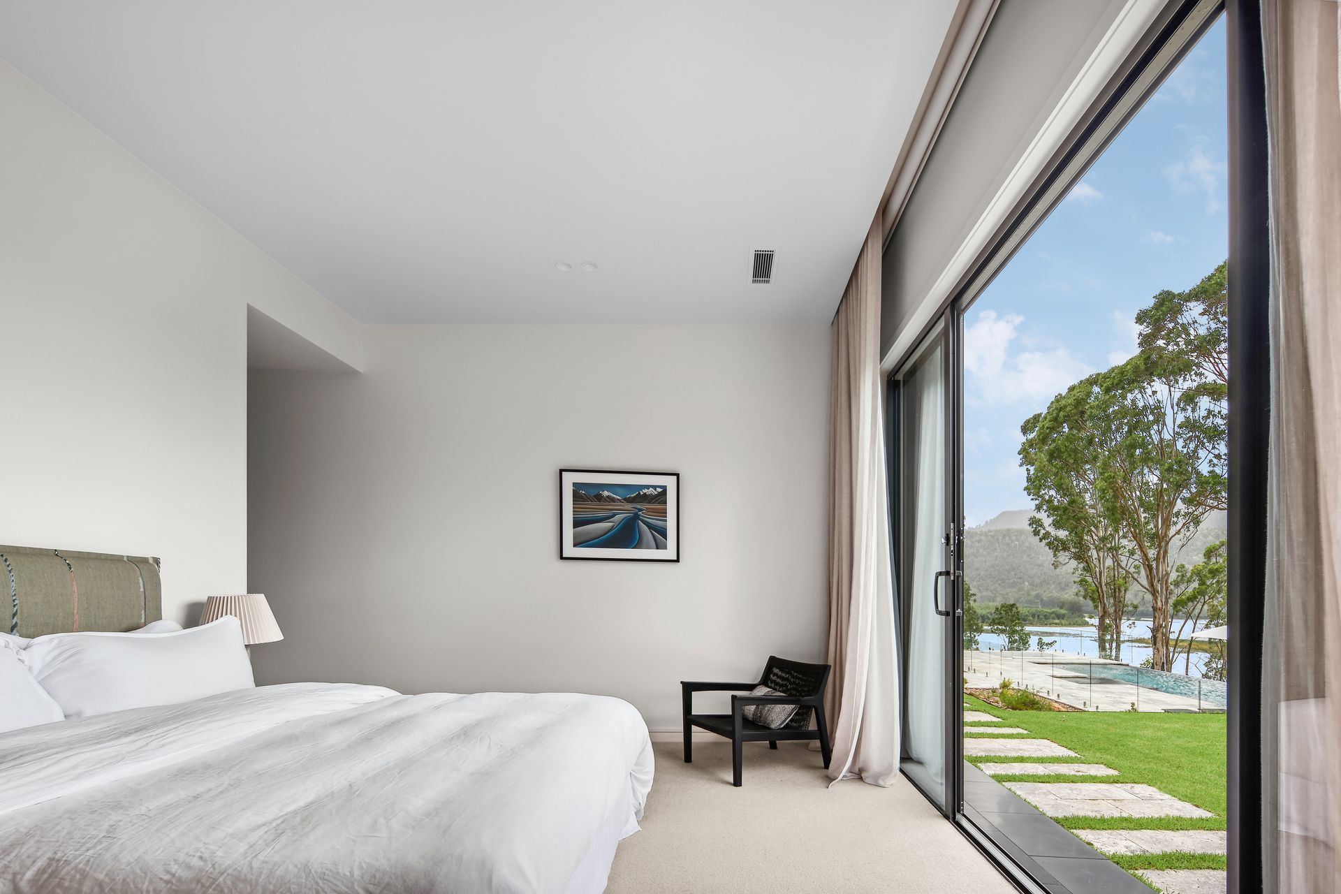 A Premium Bedroom With A Chair and Window — That Painter Guy In Vincentia, NSW