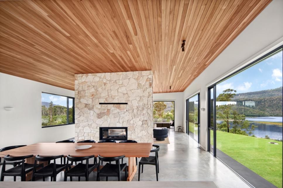 A Dining Room With A Wooden Table and Chairs and A Fireplace  — That Painter Guy In South Nowra, NSW