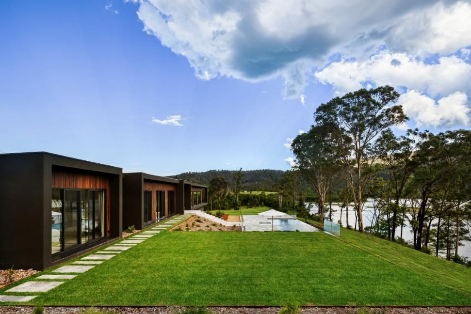 A Modern House With A Large Lawn In Front Of It and A Swimming Pool  — That Painter Guy In South Nowra, NSW