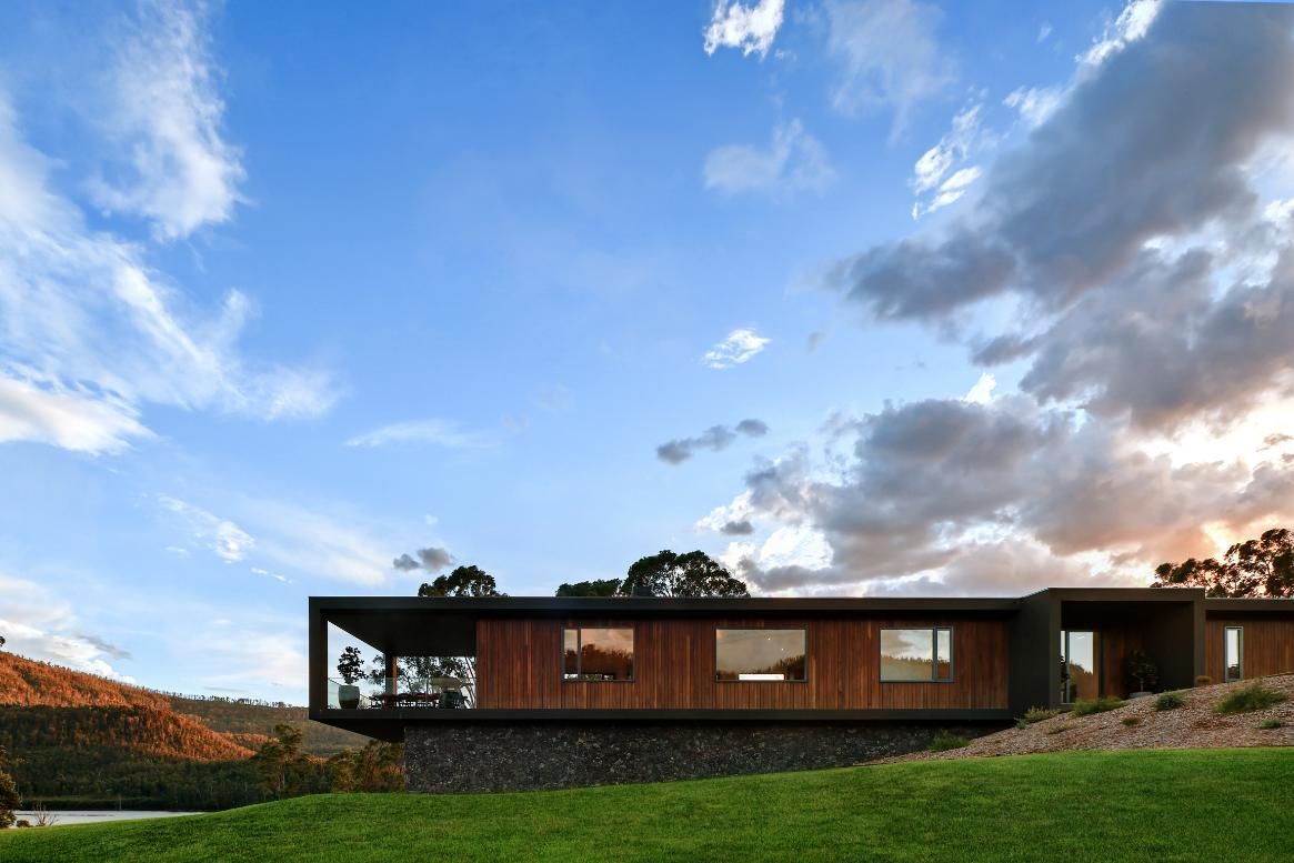 House Is Sitting On Top Of A Grassy Hill  — That Painter Guy In South Nowra, NSW