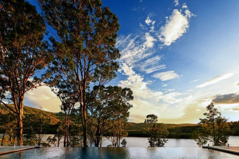 Swimming Pool Surrounded By Trees Overlooking A Lake  — That Painter Guy In South Nowra, NSW