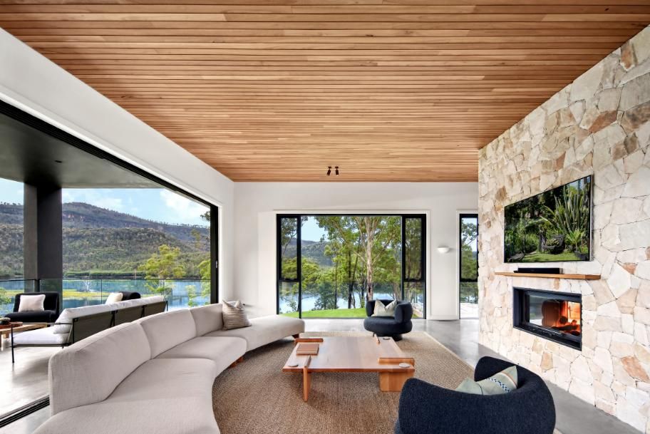 Living Room With A Curved Couch and A Fireplace  — That Painter Guy In South Nowra, NSW